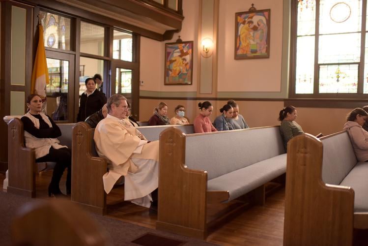 Church members wait for Easter mass to start.