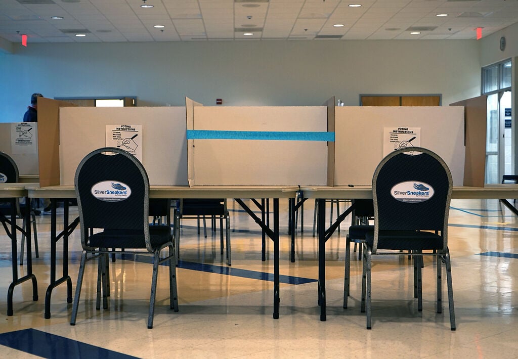 In the ARC's polling station, seats are spaced six feet apart on Tuesday