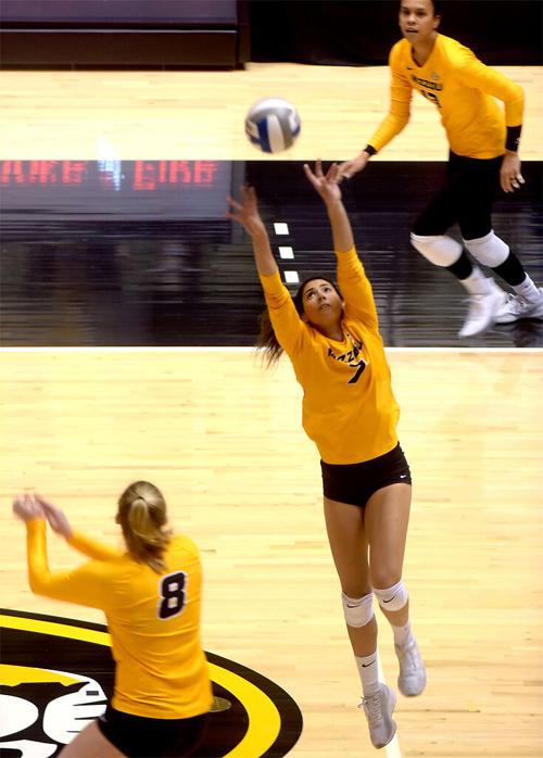 Missouri's Andrea Fuentes sets the ball