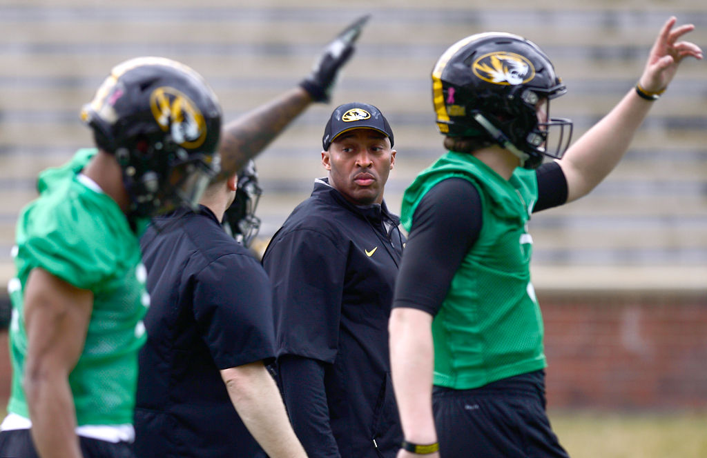 DeMontie Cross watches players at spring practice
