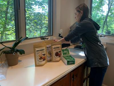 Sarah Schlafly displays her Mighty Cricket products