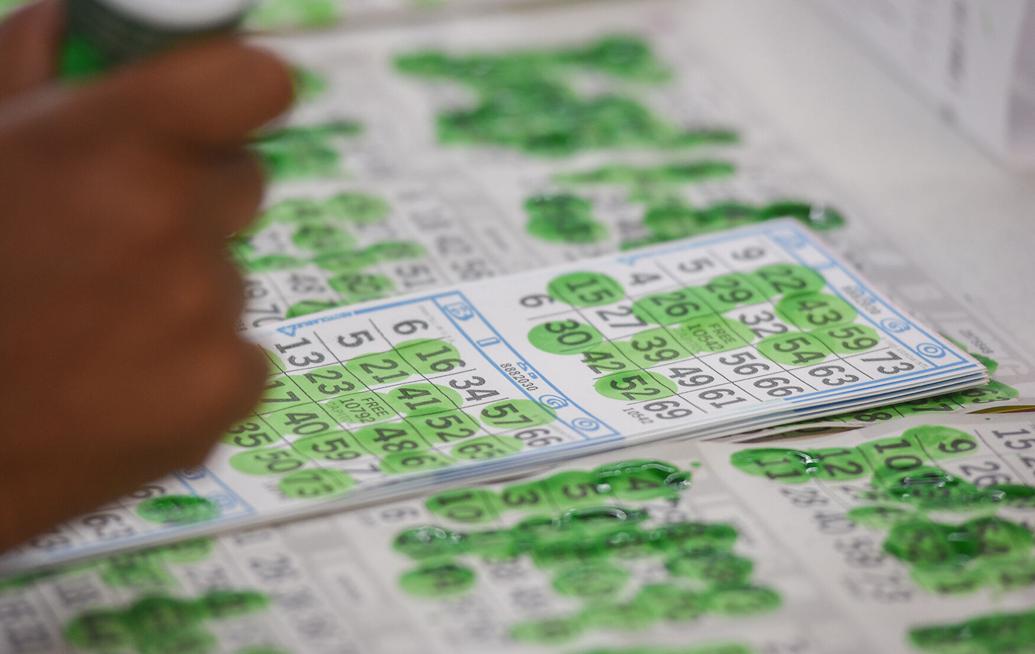 Dauber Markings Coat Bingo Sheets As Numbers Are Called Out 
