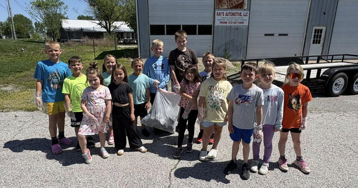 Kids at Eagle Achievers pick up trash for Earth Day