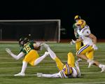 Rock Bridge junior Jack Bower falls to the ground