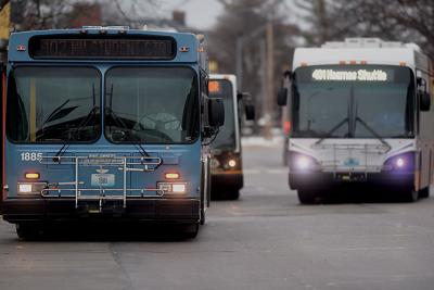 Buses wait for passengers in January of 2019 on Rollins Street in Columbia.
