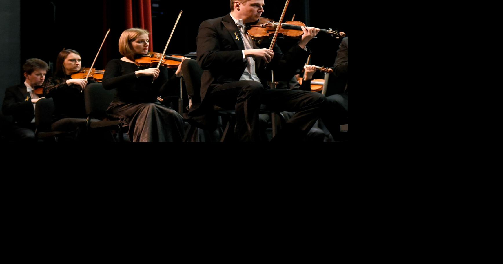 From left, violinists Andriy Kushnir, Bohdana Saviuk, Oksana