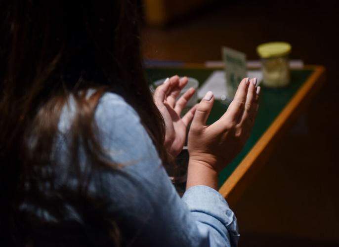Tori Schafer applauds as Joe Biden ends his speech