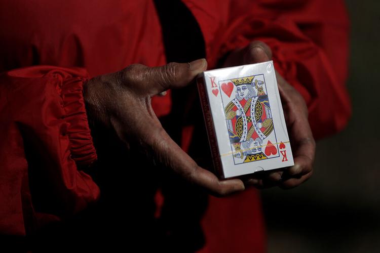 Delois Yocum, 68, shows off a pack of cards