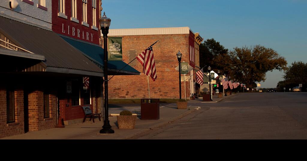 American flags hang in the relatively still evening air on Friday, Oct.2, in Appleton City, Mo