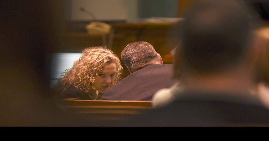 Prosecutor Kelly King listens to Special Prosecuting Attorney Kevin Zoellner during the trial of