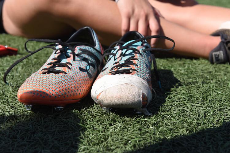 Sam Schupp changes her shoes