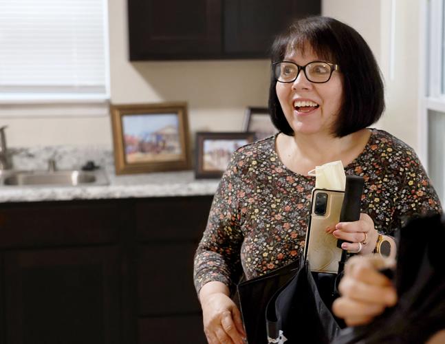 Columbia family, volunteers celebrate completion of Habitat for