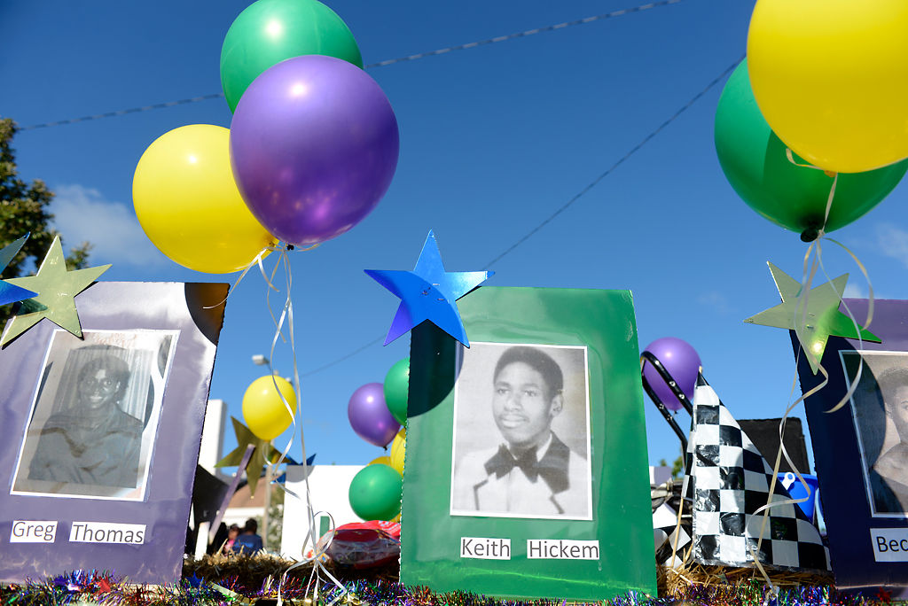 Photographs of Greg Thomas and Keith Hickem are displayed