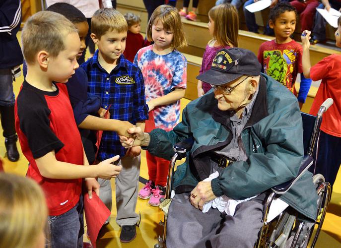 New Haven Elementary honors veterans with applause, song at assembly