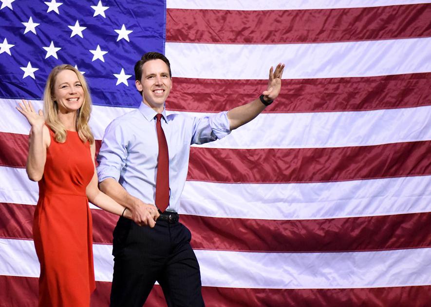Josh Hawley and his wife, Erin Morrow Hawley, walk out to ...