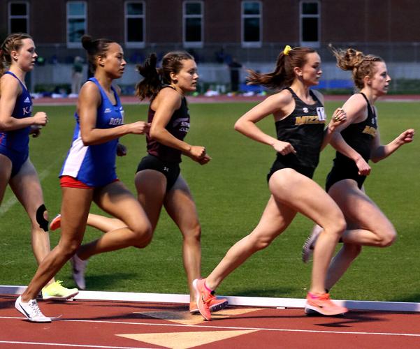 Racers compete during the 1500-meter run