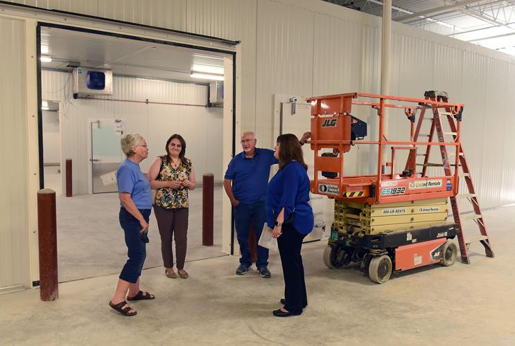 Sharon Tiff, Katie Adkins, Ed Tiff and Lindsay Lopez tour The Food Bank Market