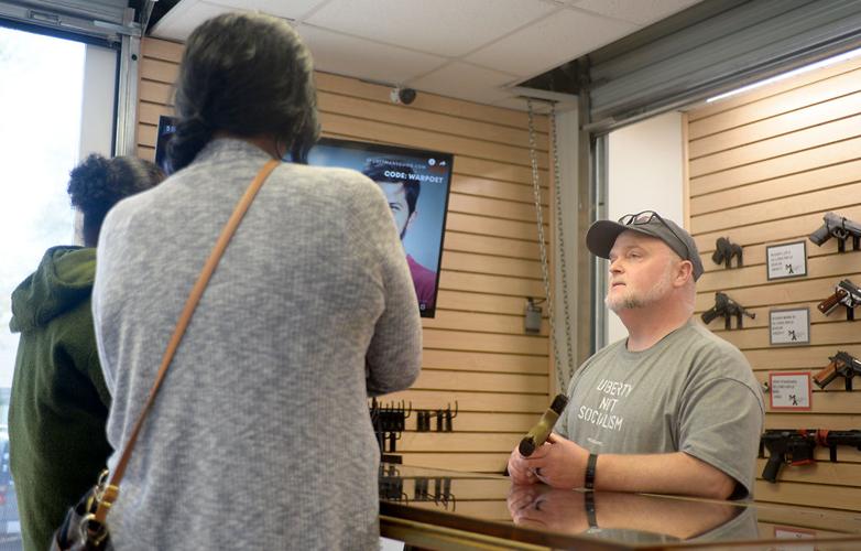 From left, Tierra Lucas and Brook Graves watch a video