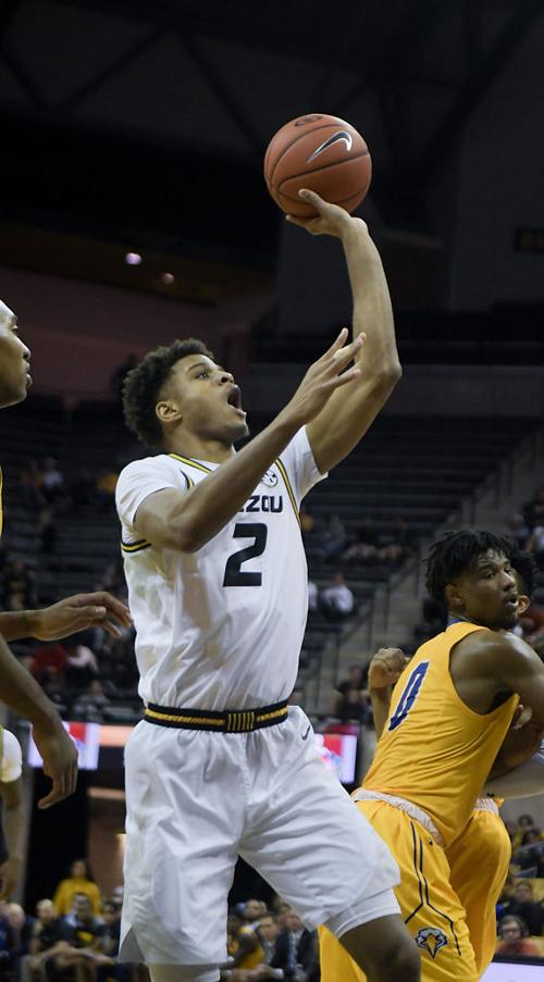 Tray Jackson Floats The Ball To The Hoop In The Home Game Against