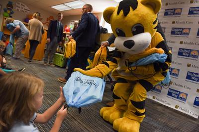 Read Across Columbia event brings 650 literacy kits to elementary schools