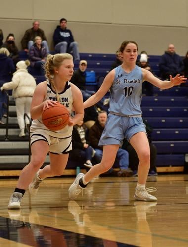 Tolton’s Sophie Angel drives to the basket on Thursday in Columbia