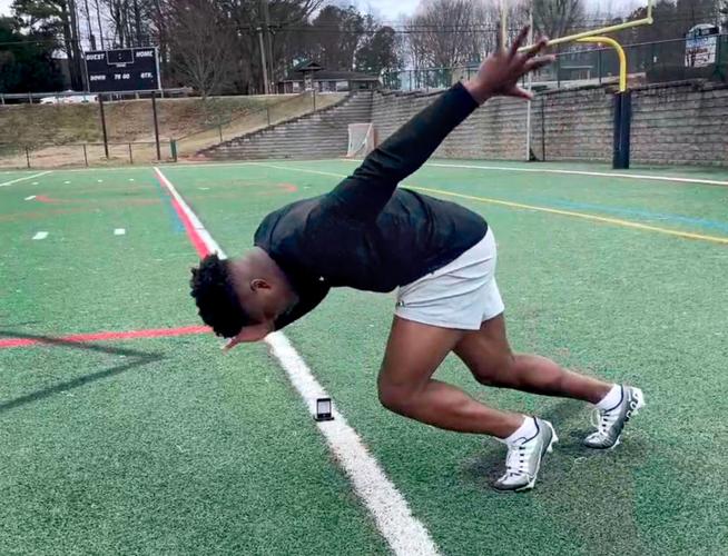Former Missouri safety Martez Manuel starts a 40-yard dash trial in Cumming, Ga.
