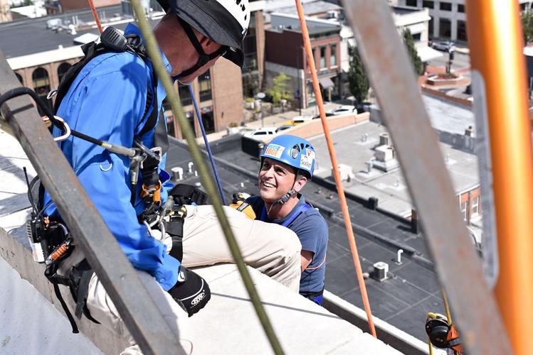 Love INC descends on poverty through rappelling event Local