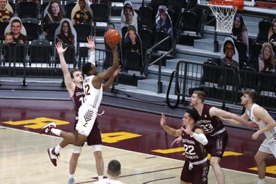 No. 21 Loyola holds on to beat Southern Illinois 60-52 ...
