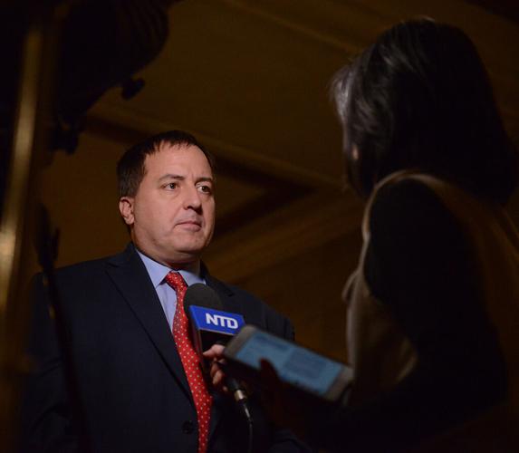Missouri Secretary of State John Ashcroft speaks to a reporter after a speech to Trump supporters