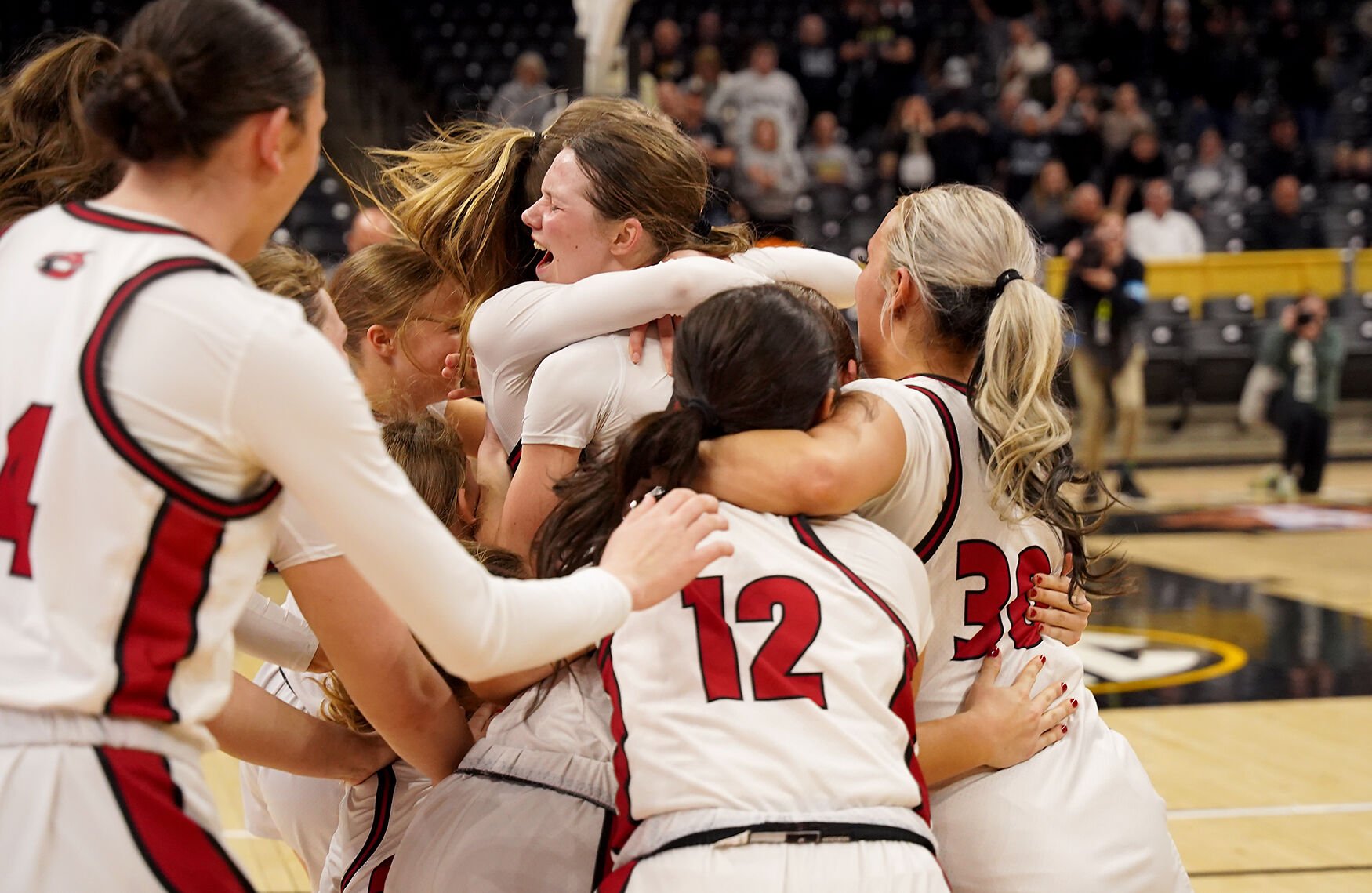 Chadwick’s team runs and embraces each other after winning the Class 1 ...