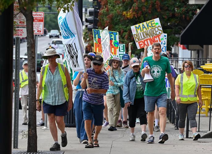 Advocates march for climate justice in annual downtown rally and 5k ...
