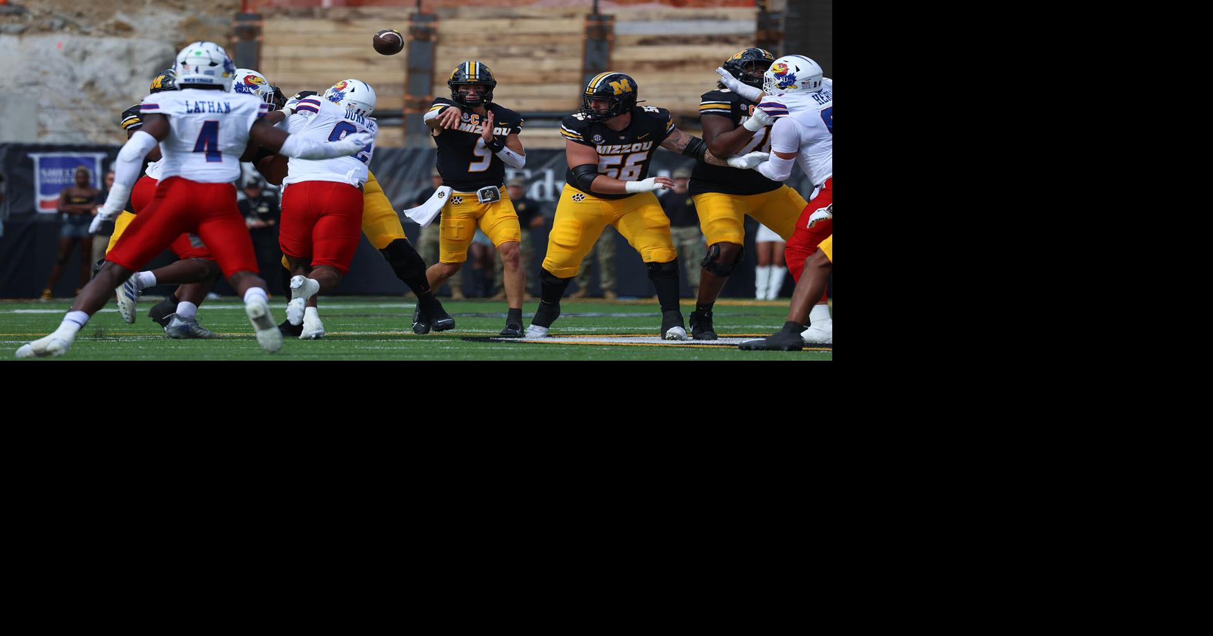 Mizzou quarterback Beau Pribula (9) passes the ball Sports