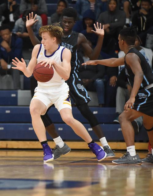 Hickman S Isaac Young Dribbles Around Oak Park High School