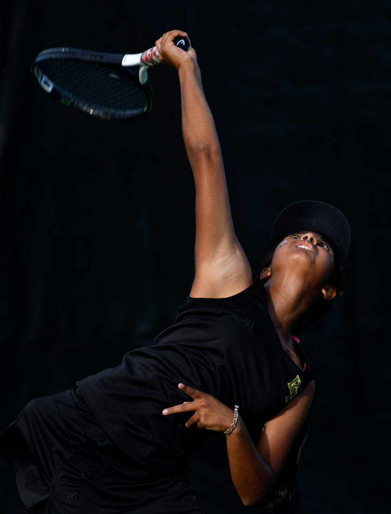 Rock Bridge tennis player Prathyankara Premkumar serves