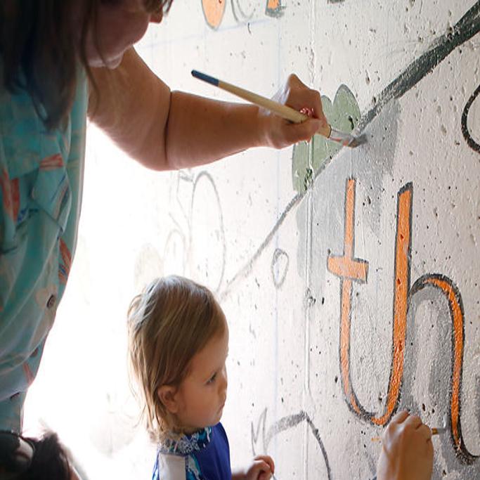 On Community Painting Day Teenage Artists Begin Work On Mural In