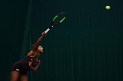 Missouri's Serena Nash launches a serve across the court