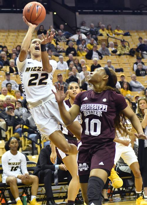 Jordan Roundtree shoots over JaMya Mingo-Young