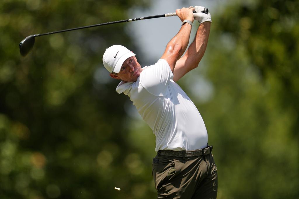 Rory McIlroy lining up a putt during the opening round of the BMW Championship at Bellerive.