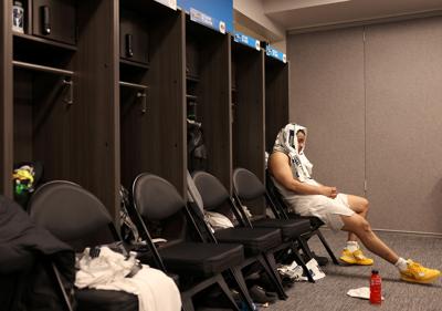 Nick Honor reflects in the locker room