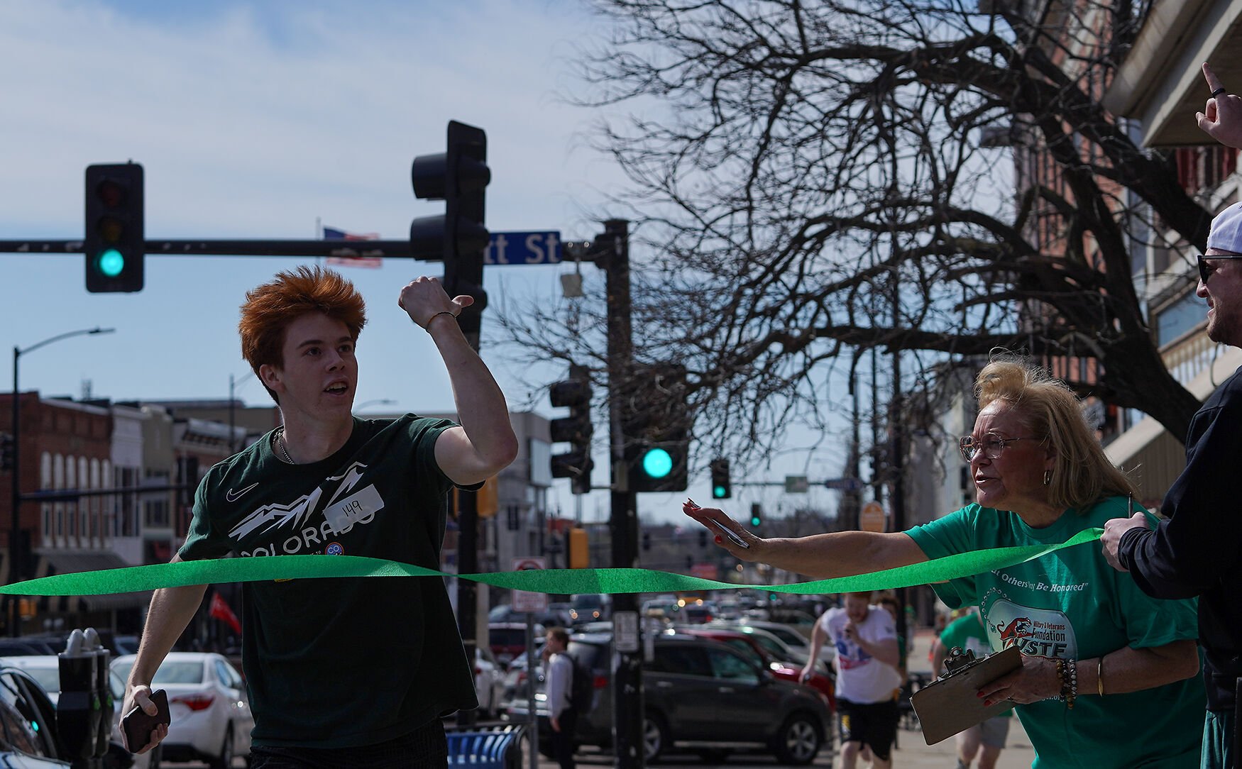 Ryan Loomer, a Mizzou junior, crosses the finish line during the first ...