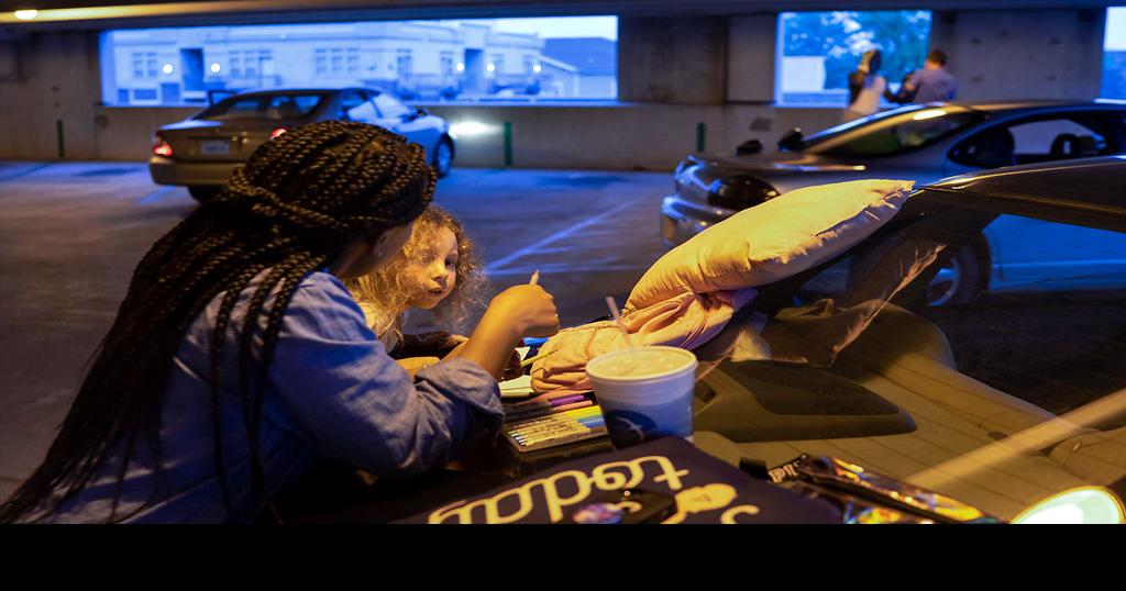Arlene Cross and Giselle Williams color drawings in Hitt Street Parking