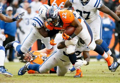 Luck leads Colts to upset of Manning and Broncos 24-13, Pro Sports