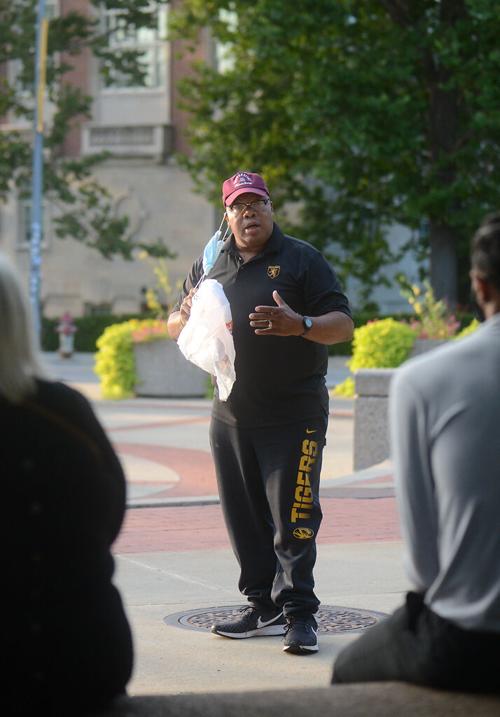 Rev. James Gray speaks to the crowd at an event organized by Rise Up