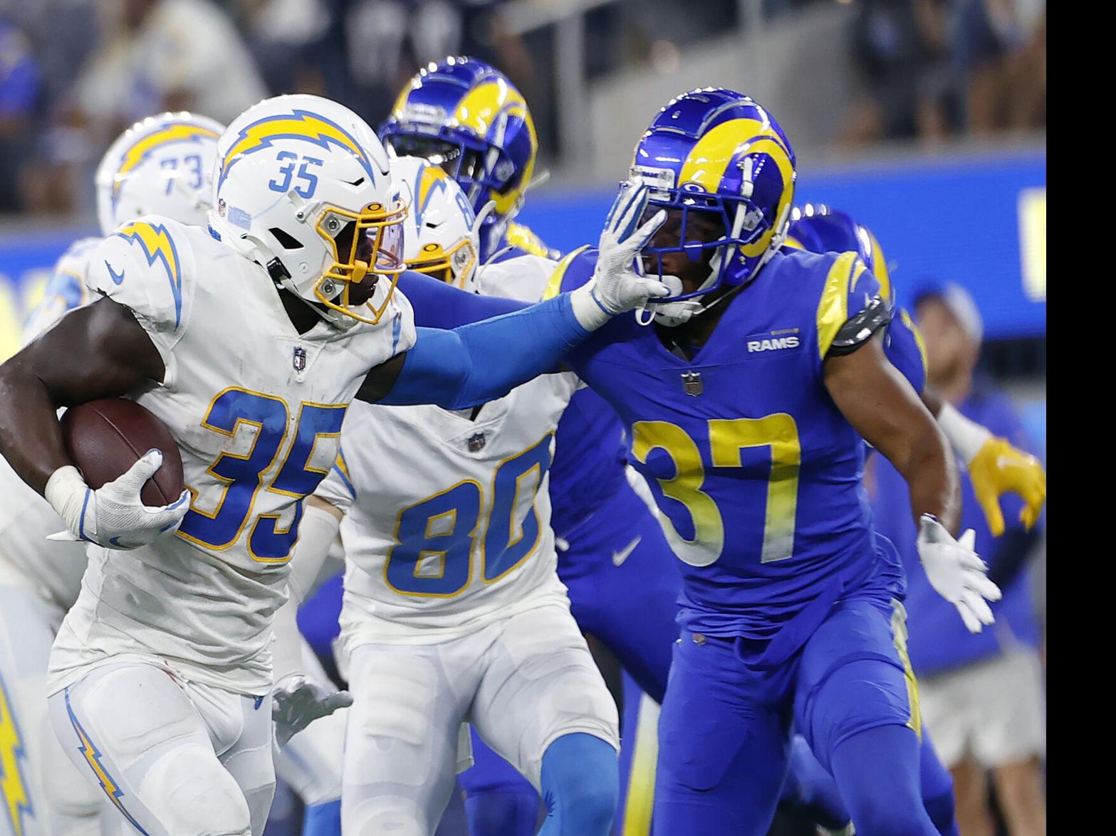 Chargers tackle Rams in SoFi's first game with fans