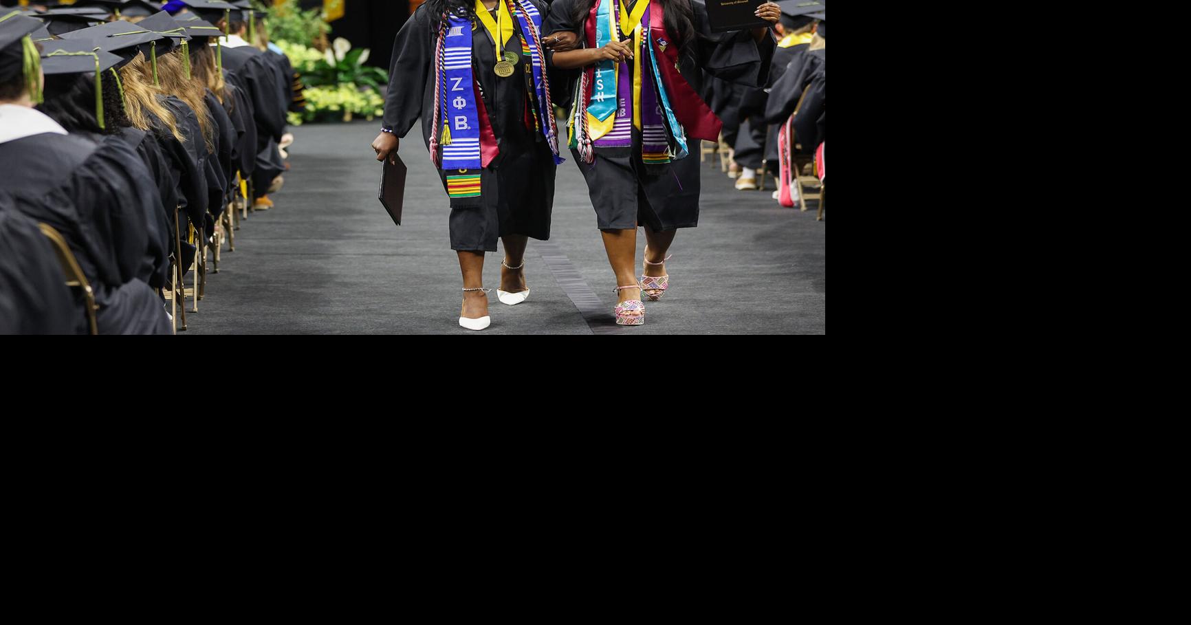 Lydia Juitt, left, and Aaliyah Jackson walk back to their seats