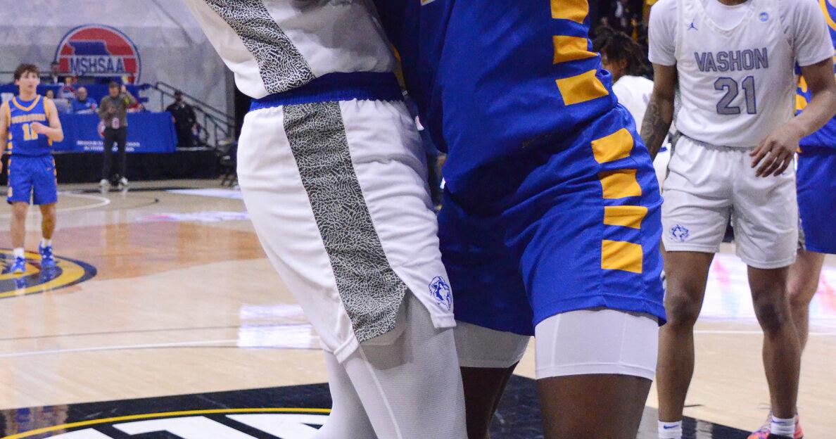 Varshon Reed Vashon forward Nicholas Randall, left, and John Burroughs center ...