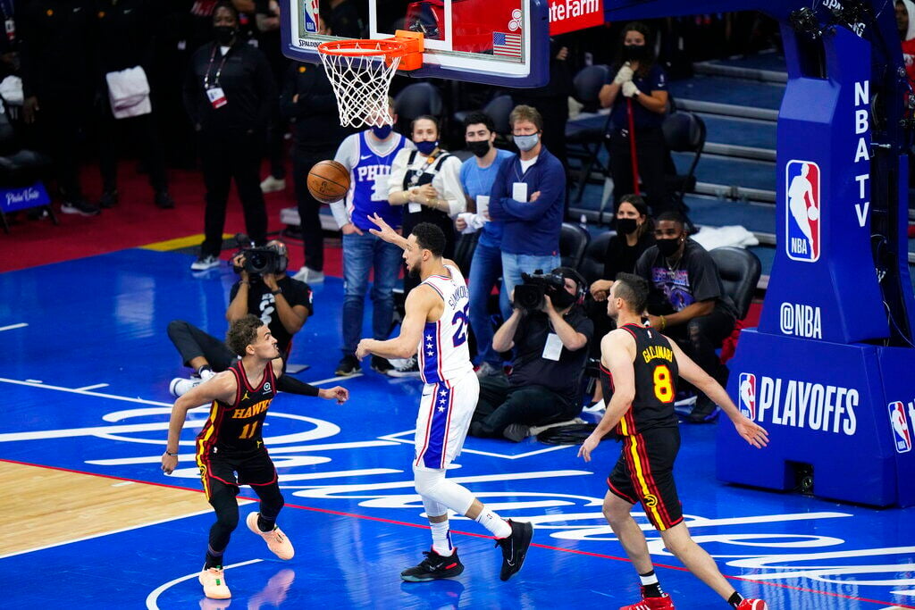 Philadelphia 76ers' Ben Simmons (25) reacts after dunking the ball