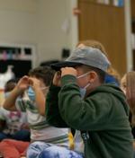 Students use their hands to emphasize focus during