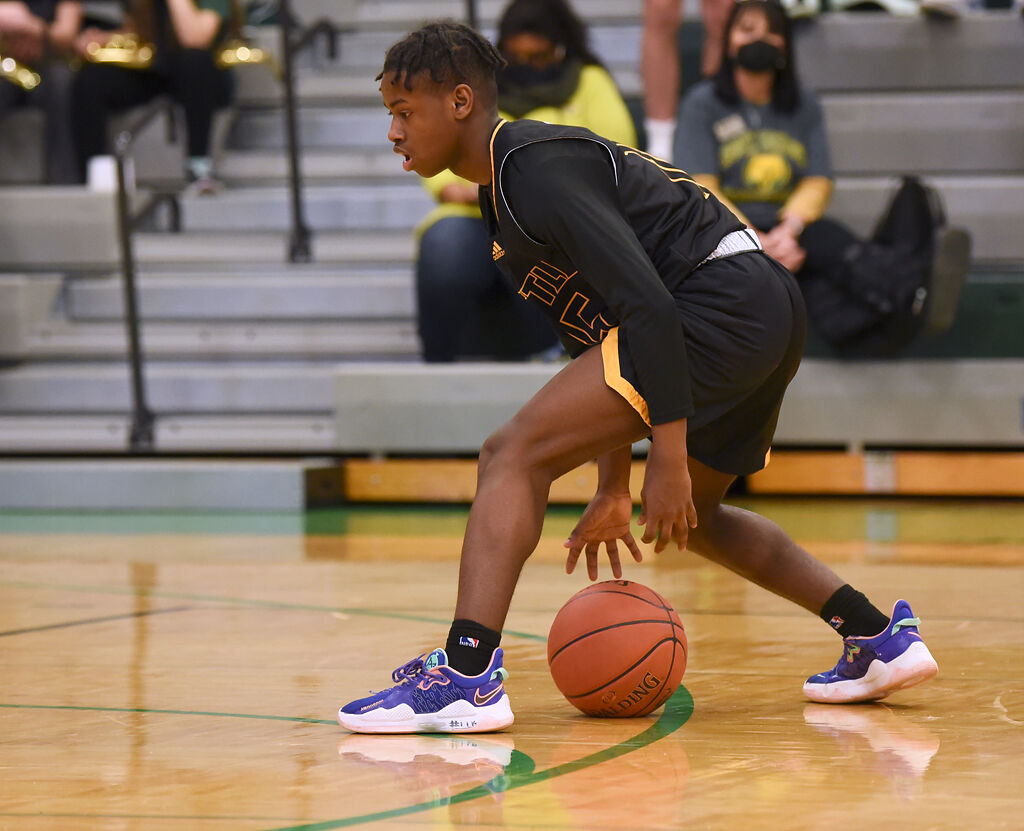 Rock Bridge boys basketball pulls out 