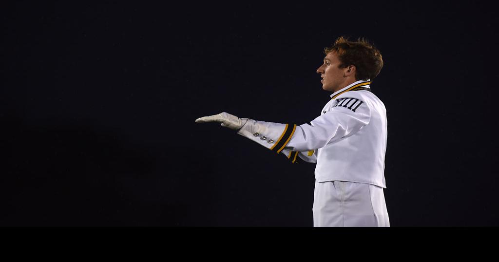 Drum major Jake Hiley directs Marching Mizzou and its guest performers